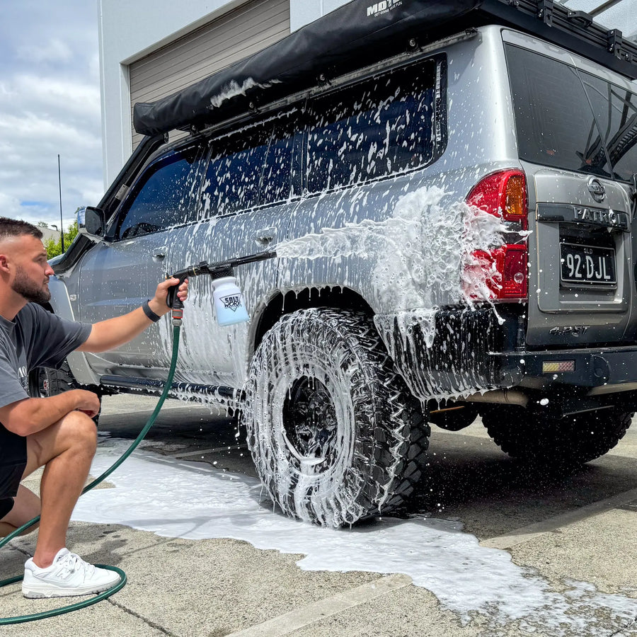 Saltworx Garden Hose Foam Gun foaming a 4WD Patrol