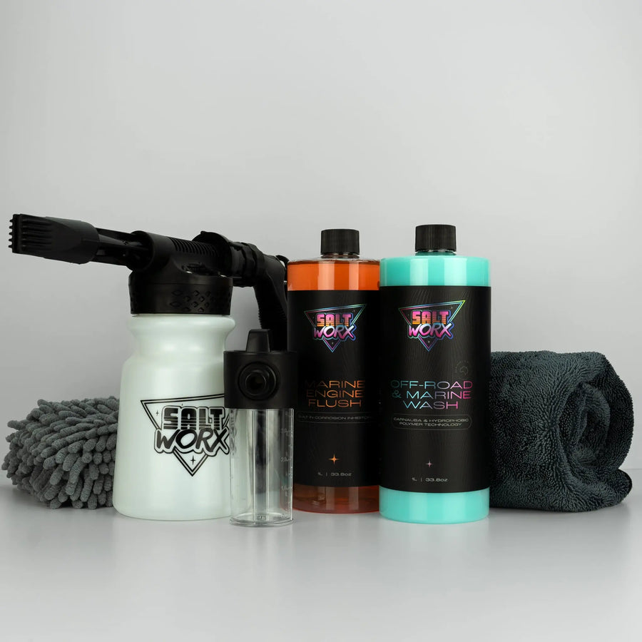 Saltworx Marine Wash & Flush Kit contents laid out - foam gun, flusher, concentrates, sponge and towel