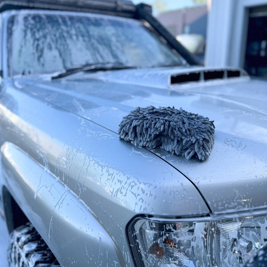 Saltworx microfibre wash sponge in use on a 4WD Patrol
